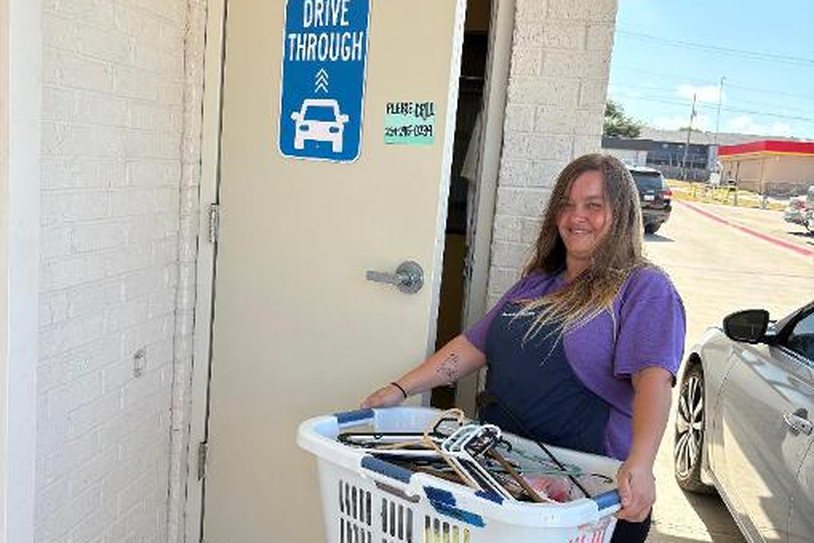 WaveMAX Temple, TX — Olaf Dr. | WaveMAX Laundry 21 Customer using the drive-thru door at WaveMAX Laundry Temple, TX