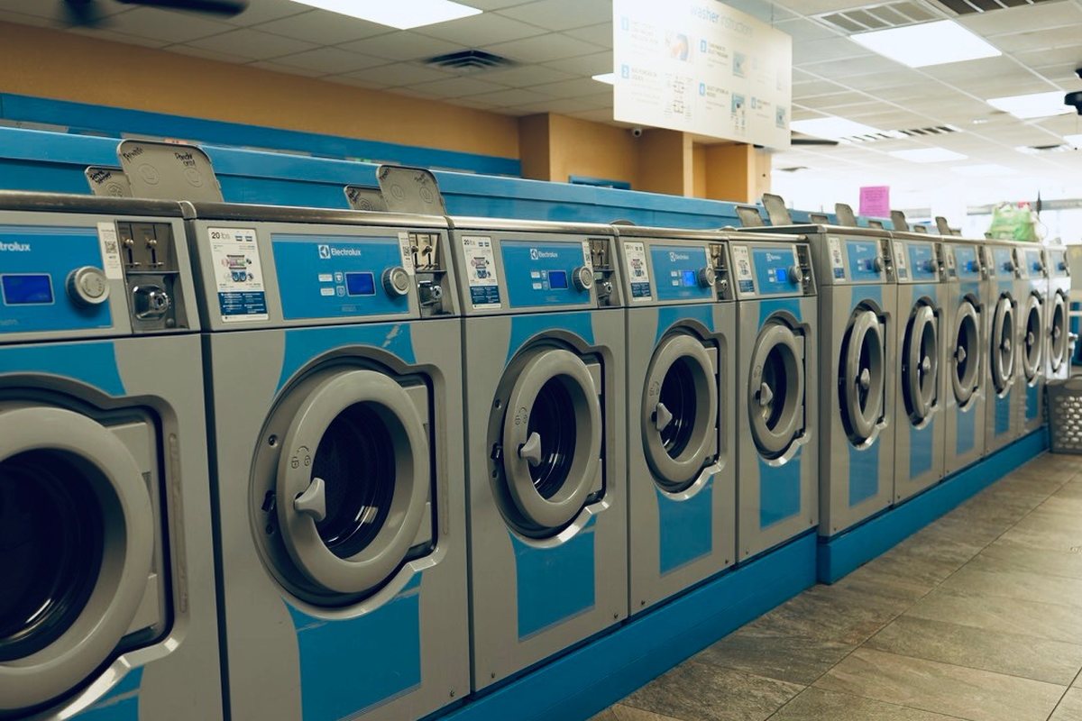 WaveMAX Temple, TX — Olaf Dr. | WaveMAX Laundry 11 Row of large-capacity washers at WaveMAX Laundry Olaf Drive, Temple, TX
